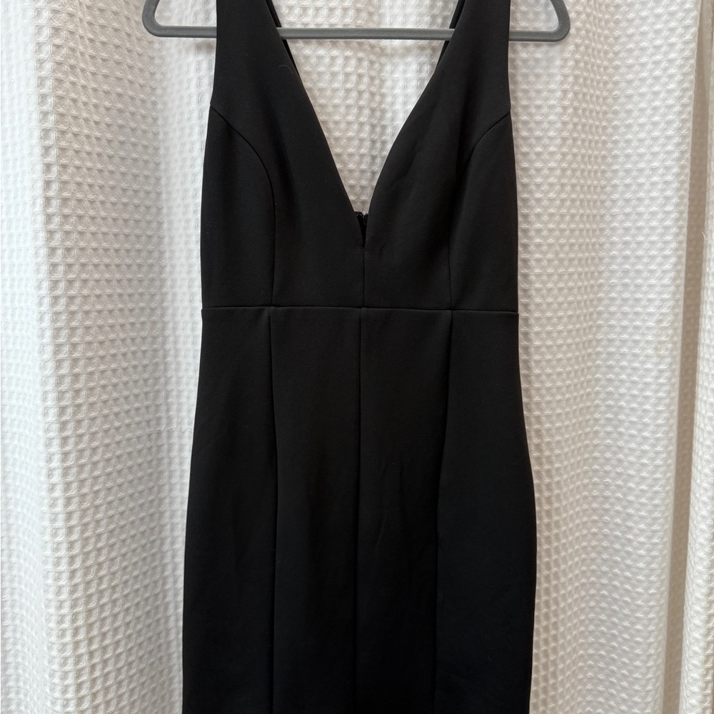 Elegant Black Sleeveless Mini Dress with Plunging Neckline